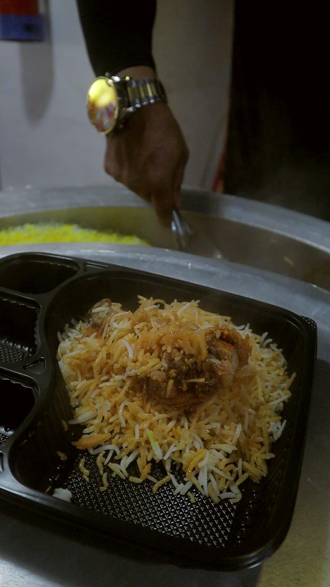 Biryani served into a meal box