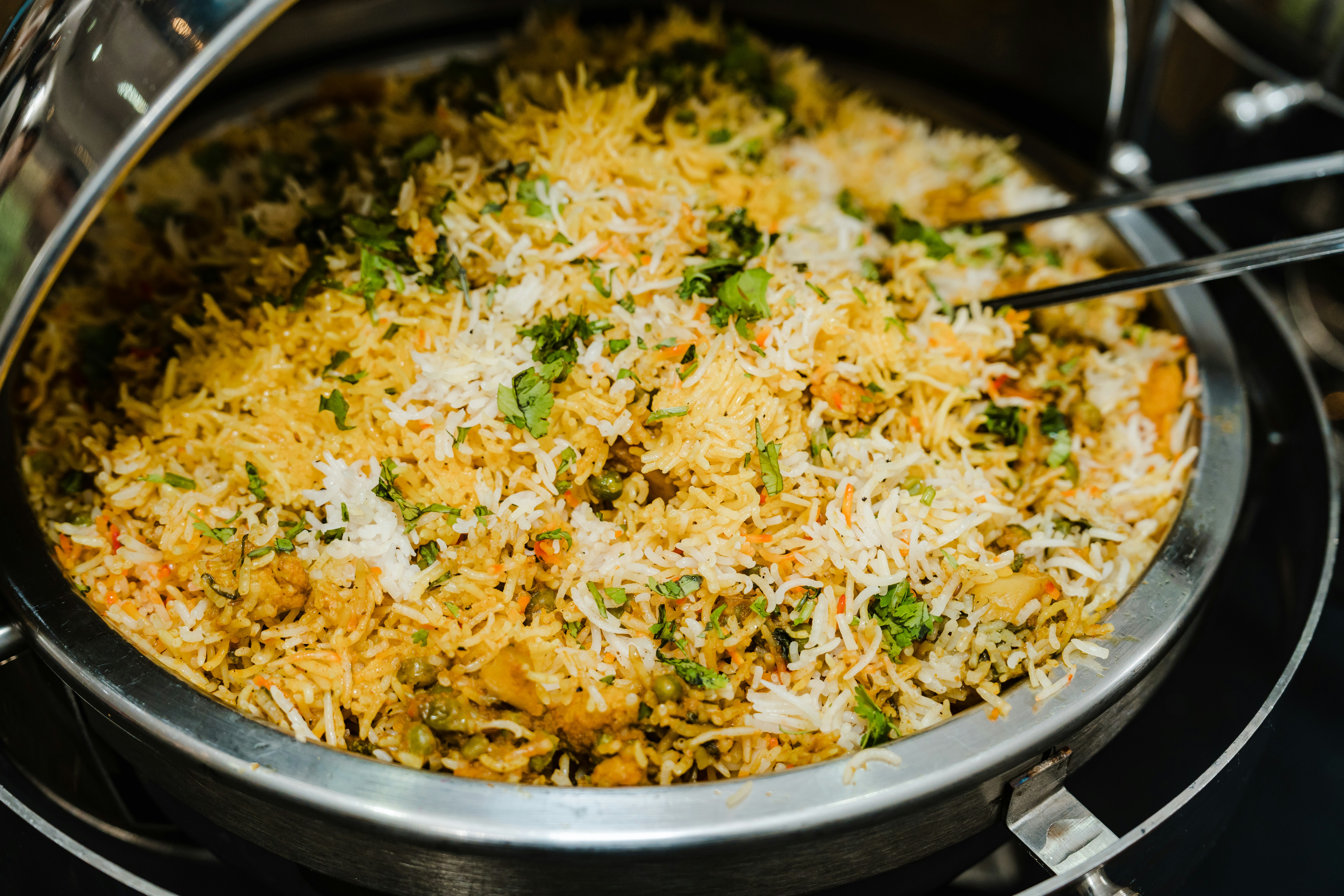 A copper-trimmed handi of biryani